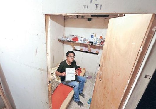 香港房中房住户年轻化 有80后称收入少惧谈恋爱